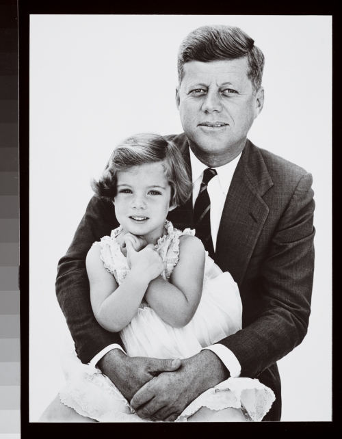 It's the Kennedy's!  Or at least some of them.  Caroline Kennedy and her father John Kennedy, snuggle up for some father daughter time!